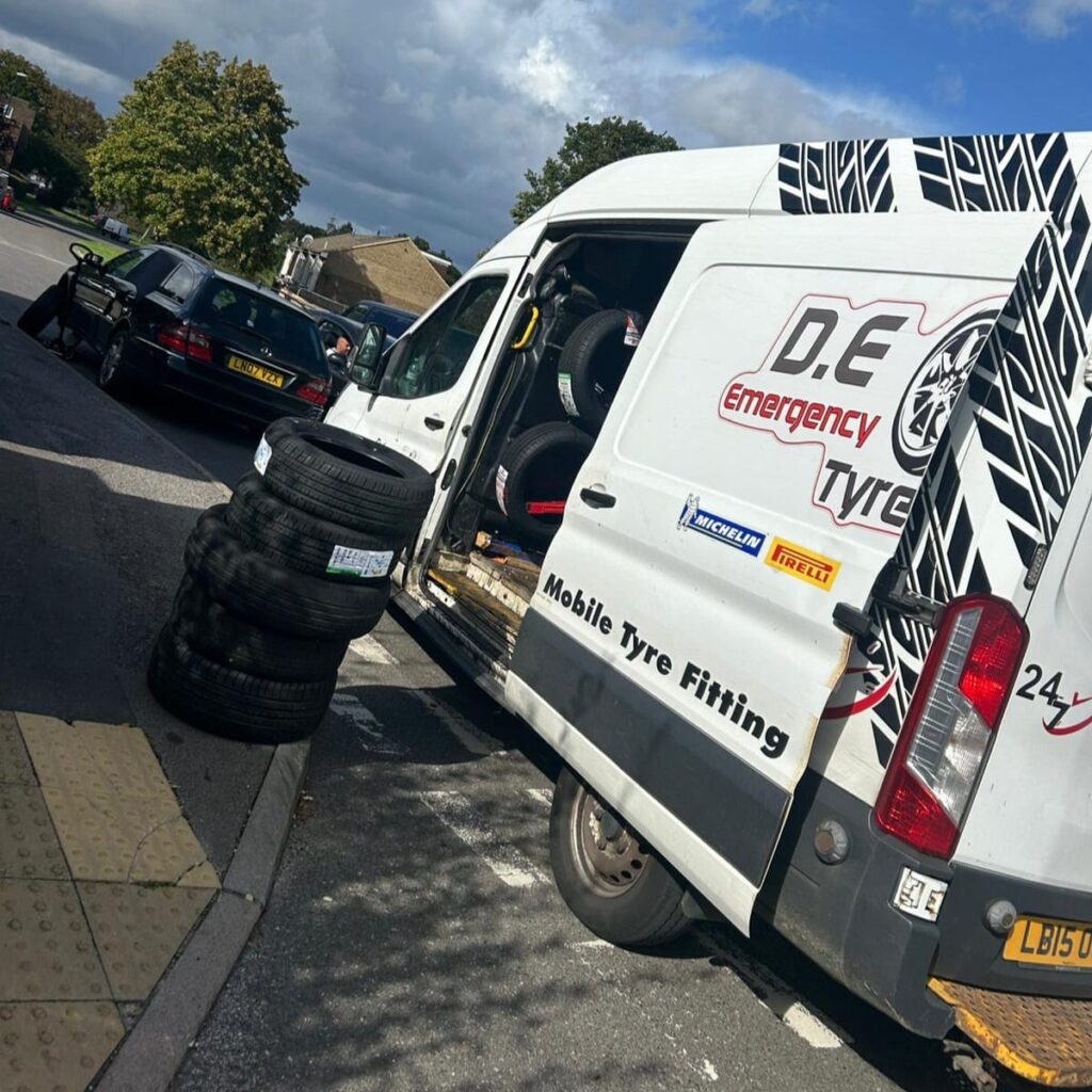 Roadside mobile tyre fitting with new tyres D.E Emergency Tyres van with new tyres ready for roadside tyre replacement