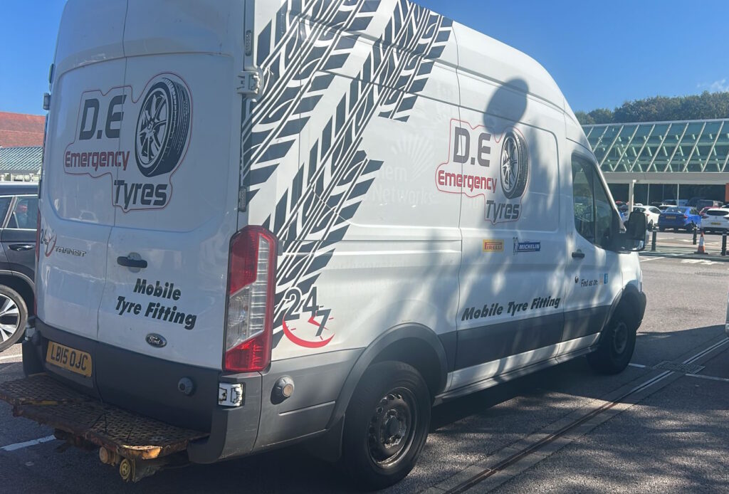 D.E Emergency Tyres van D.E Emergency Tyres van parked in car park